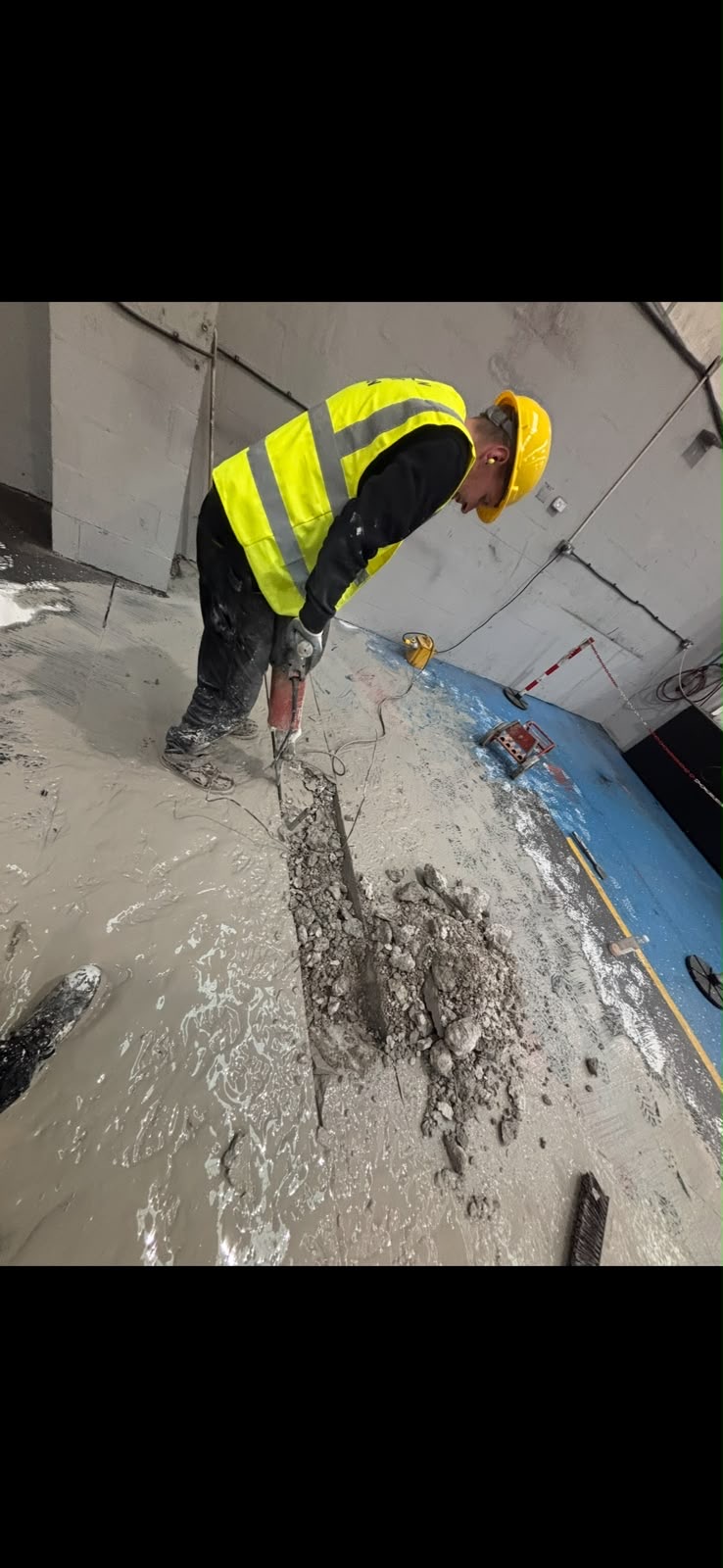 Concrete floor breaking for drain access