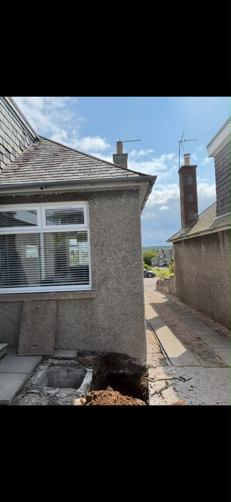 External drain repair alongside property